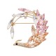 Брошь Птица crystal peach gold
